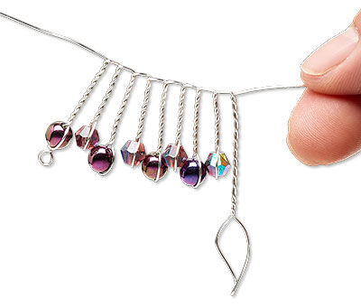 Twisted wire with beads